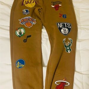 Pants Only Color tan. Hollister NBA sweat pants. Large, has tags never worn.